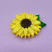 Load image into Gallery viewer, Yellow sunflower brooch on a purple background
